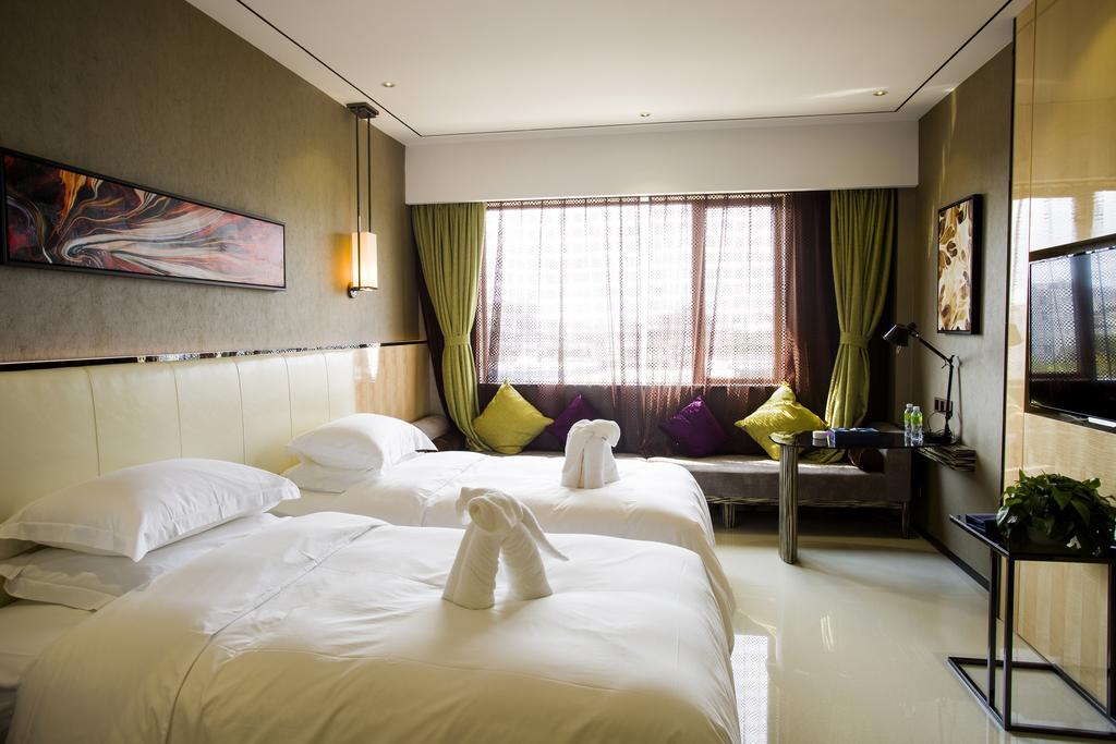 Lori Star Hotel Qionghai Стая снимка